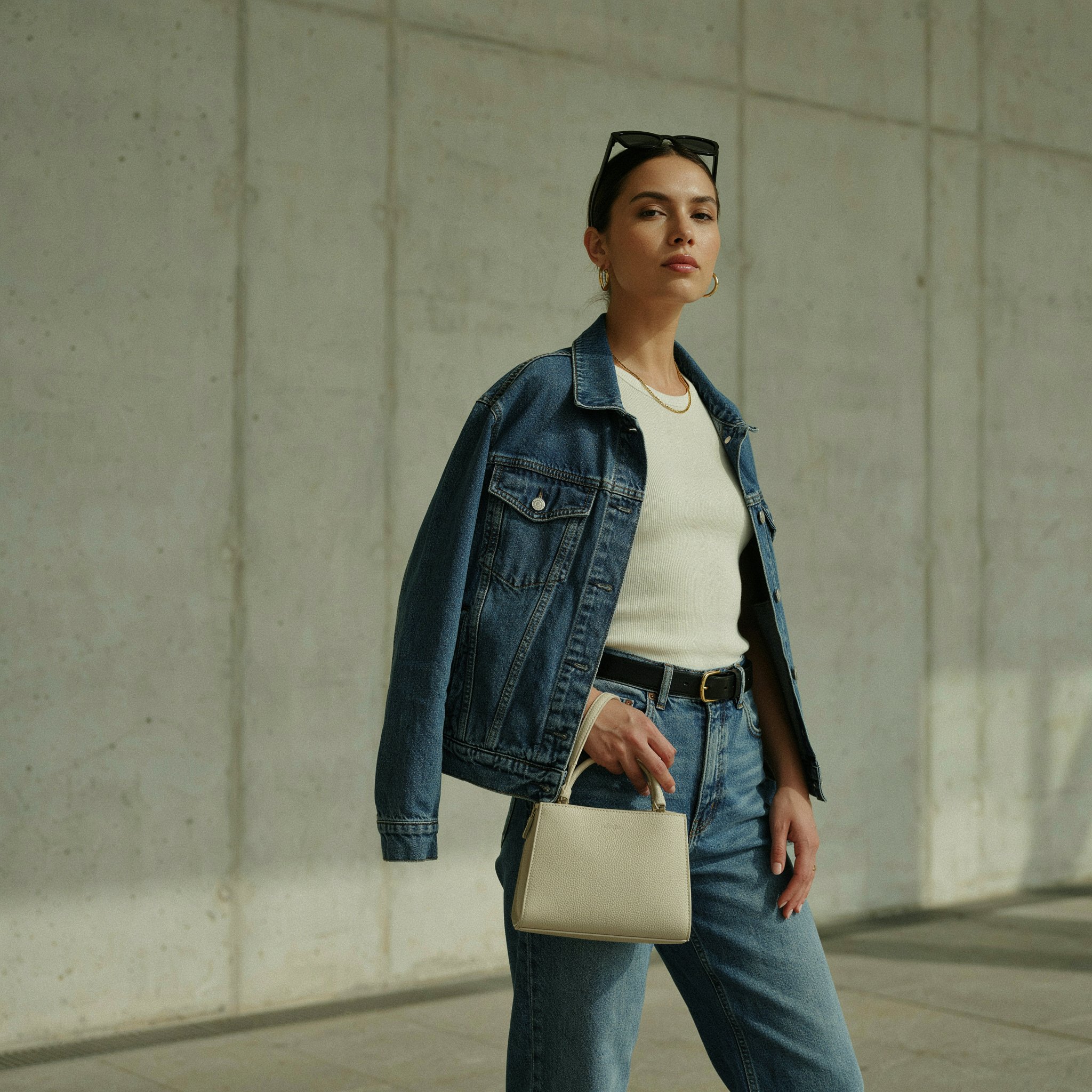 Minimal accessories styled with a modern denim outfit