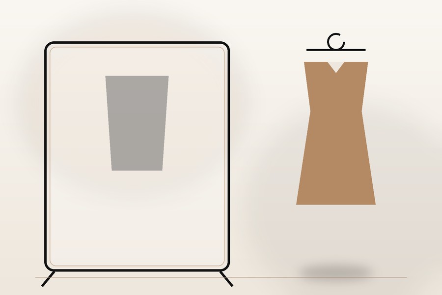 Choosing an outfit in front of a mirror